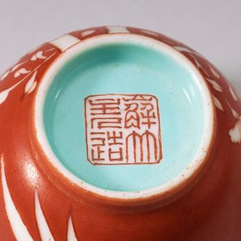 A pair of coral-red ground "Bamboo" cups, Qing dynasty, 19th Century.