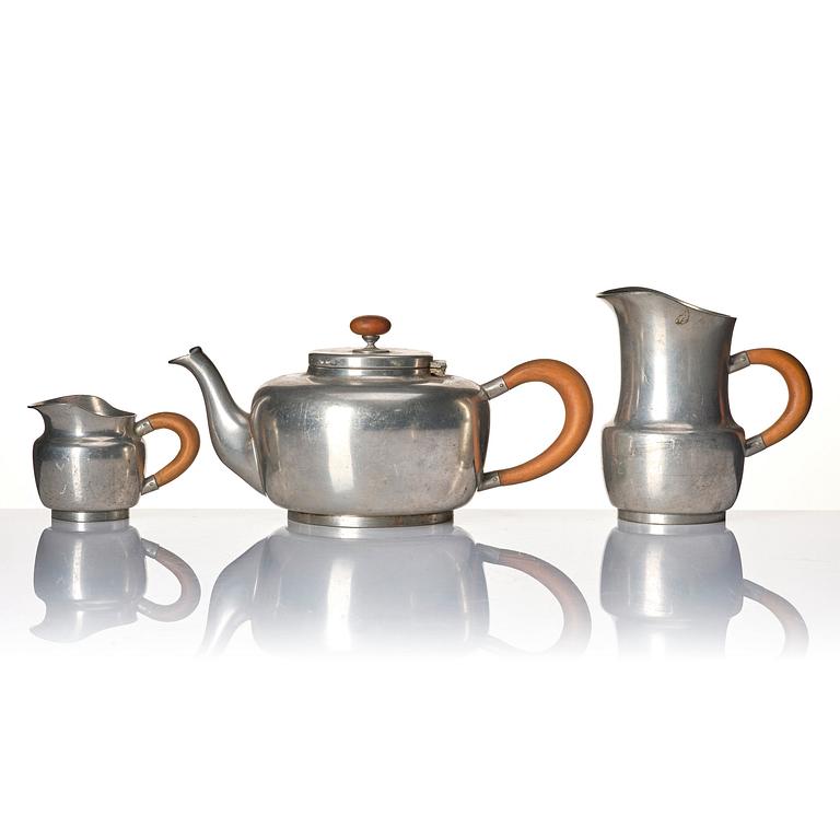 Josef Frank, a four pieces pewter tea service and a tray, model "A2330", Svenskt Tenn, Stockholm 1946 (tray 1929).