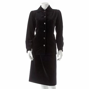 YVES SAINT LAURENT, a two-piece black velvet dress consisting of jacket and skirt, from the Russian collection.