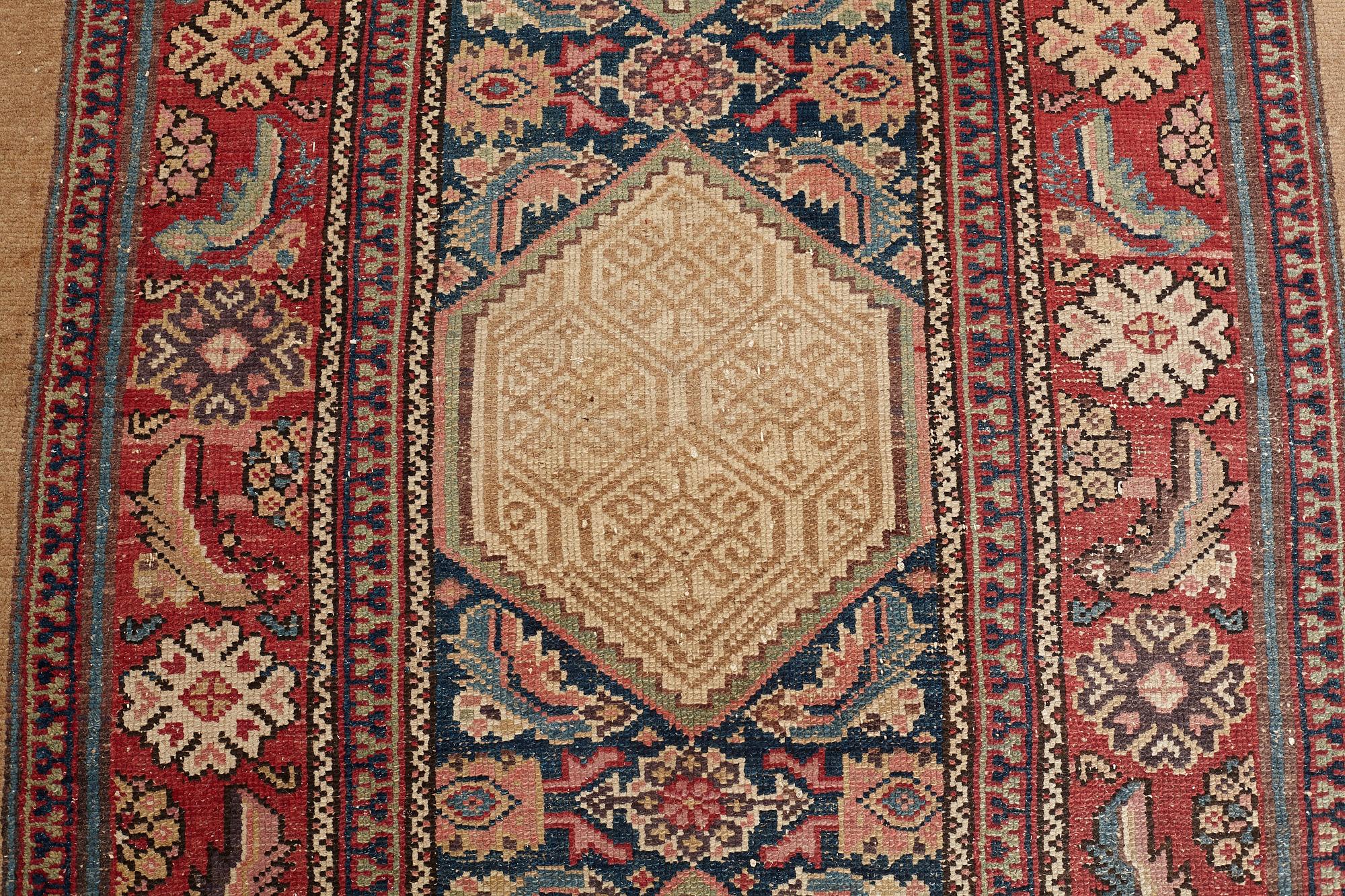 MATTO, an antique/semi-antique Hamadan, one of a pair, ca 517,5 x 112,5 cm (as well as 2 cm flat weave at each end).