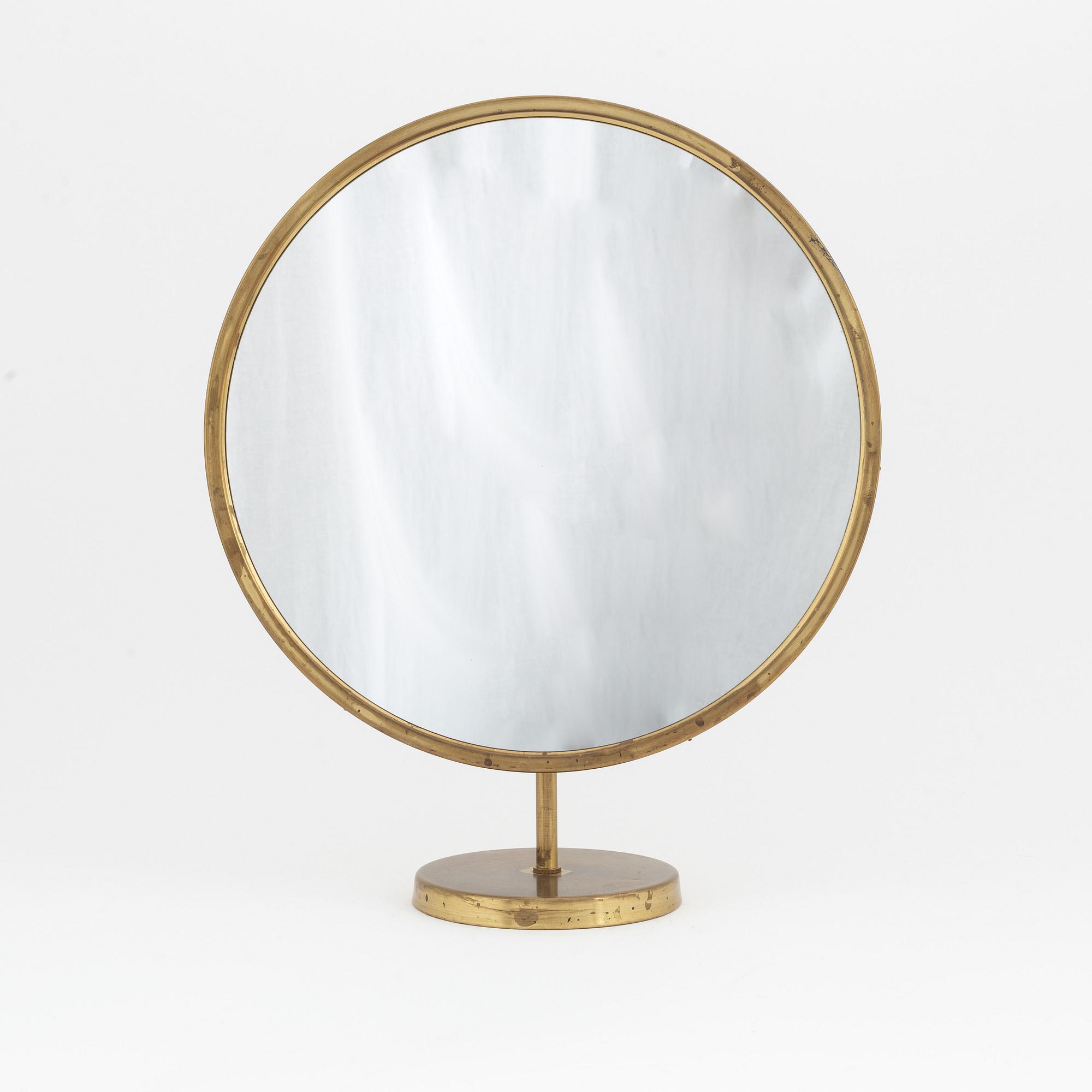 A Swedish Modern brass table mirror, 1940's/50's.