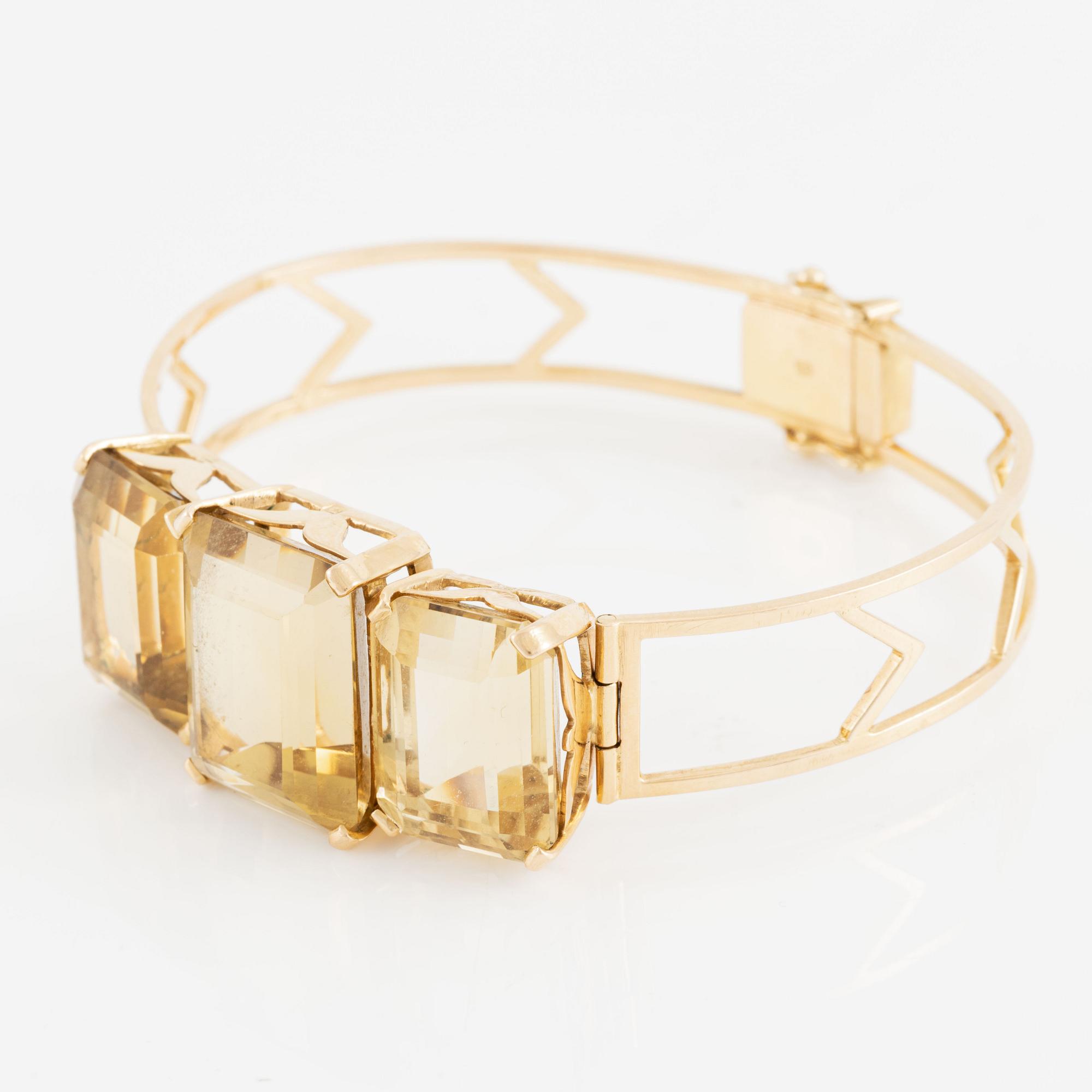 Armband 18K guld med fasettslipad kvarts.