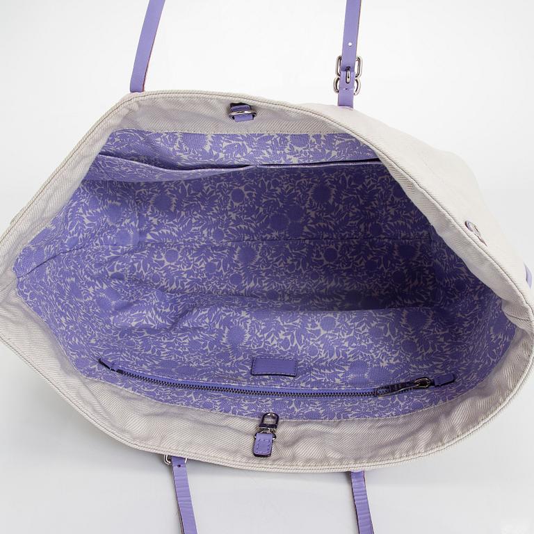 Louis Vuitton, a 'Cotton Canvas Articles De Voyage Cabas GM' bag.