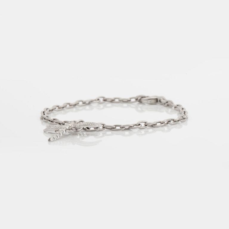 A Tiffany & Co brilliant-cut diamond bracelet with a dragonfly.