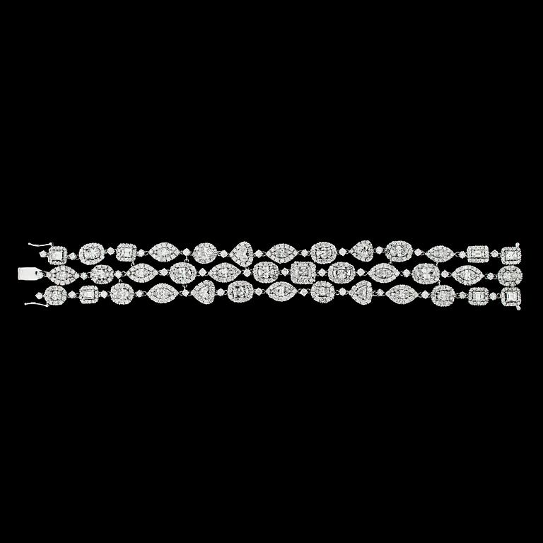A drop- navette- and brilliant cut diamond bracelet, tot. 25.50 cts.