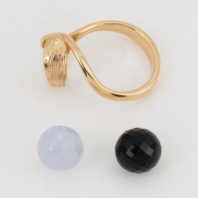 PER BORUP, a  "Changeling" ring with chalcedony and hematite beads.