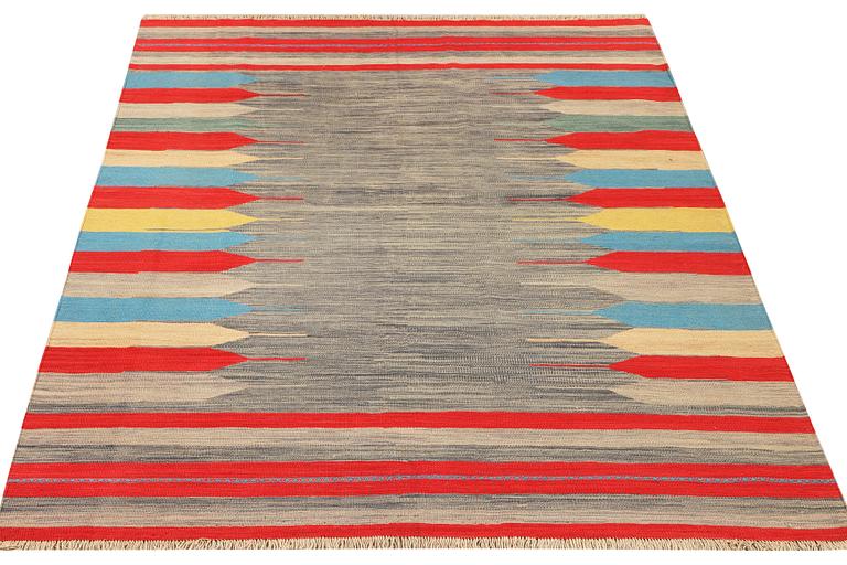 An Afghan Kilim carpet, c. 293 x 199 cm.