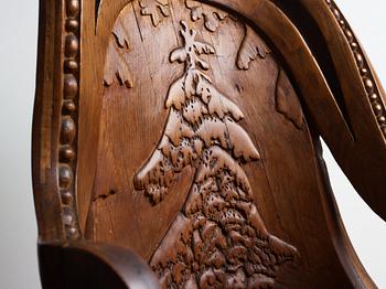 Knut Fjaestad, an Art Nouveau sculptured and carved pine throne, Sweden early 20th century.