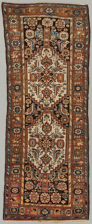 A semiantique Hamadan carpet ca 313 x 124 cm.