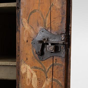 A wall cabinet, folk art, Västergötland dated 1773.