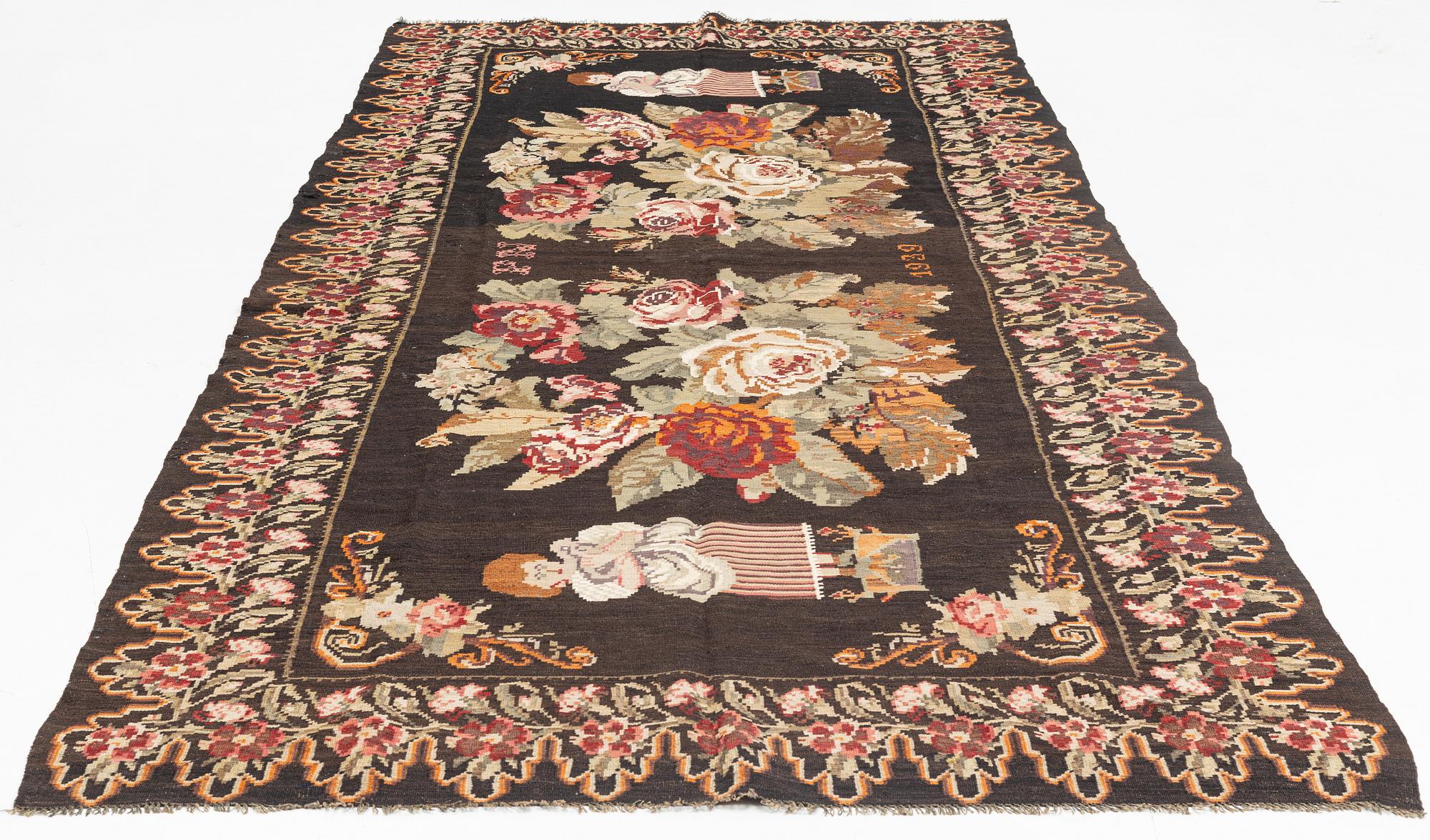 A Kelim carpet, Moldova, dated 1939, circa 385 x 174 cm.