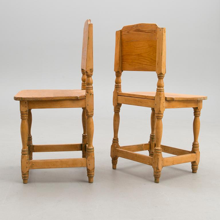 A pair of late 19th century provincial wooden chairs.