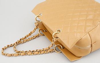 A Chanel caviar leather handbag.