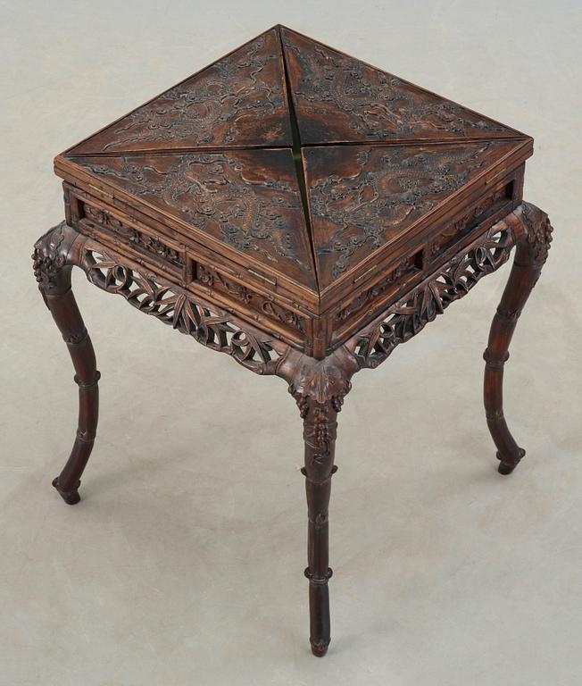 A hardwood games table, late Qing dynasty (1644-1912).