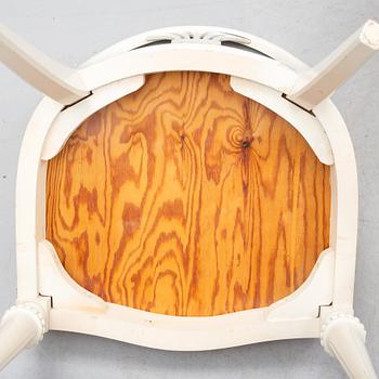 Four chairs with dinner table, late 20th Century.