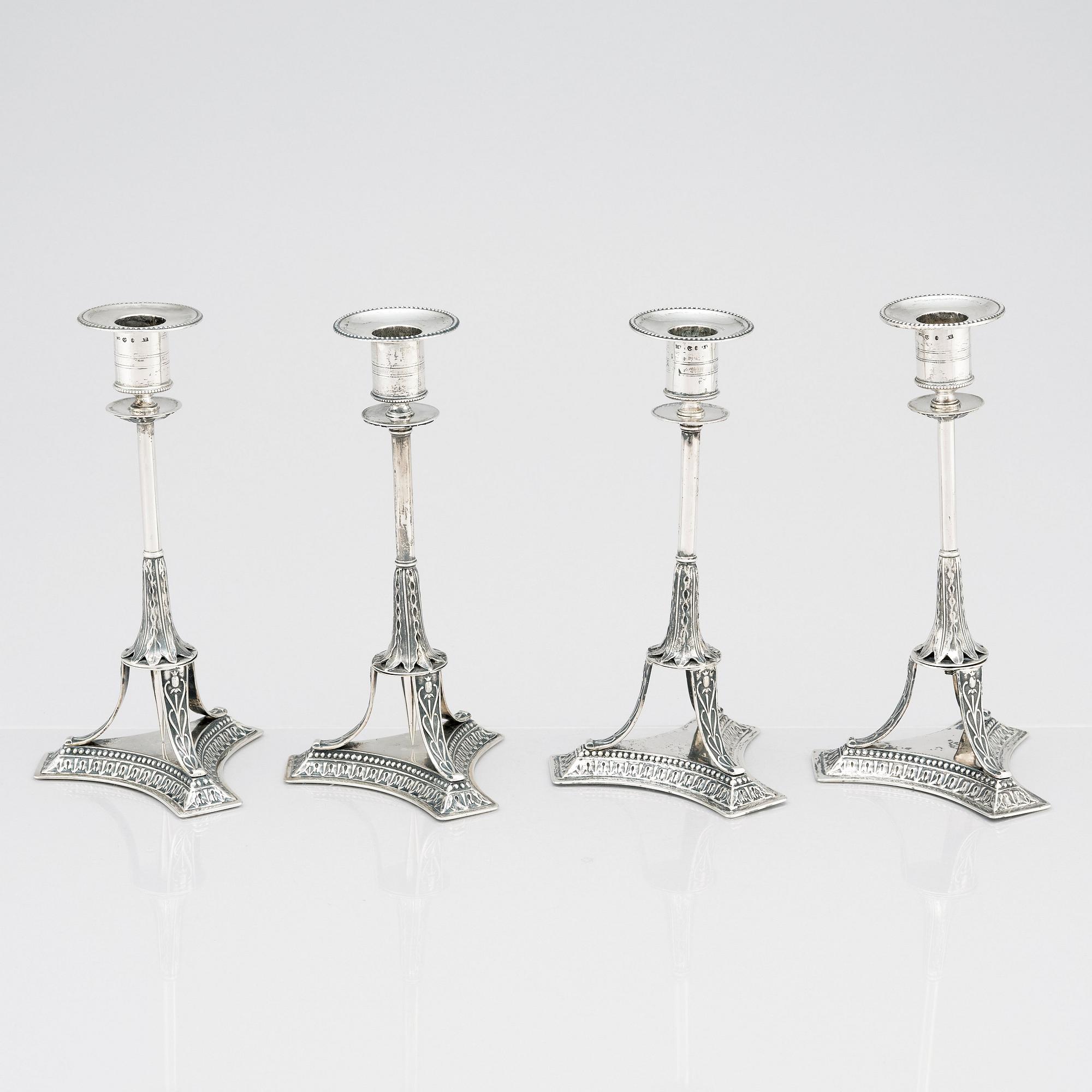 Four Swedish early 19th Century silver candlesticks, mark of Adolf Zethelius, Stockholm 1814 and 1818.