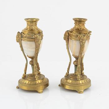 A pair of Napoleon III Louis XVI-style gilt-bronze cassolettes, later part of the 19th Century.