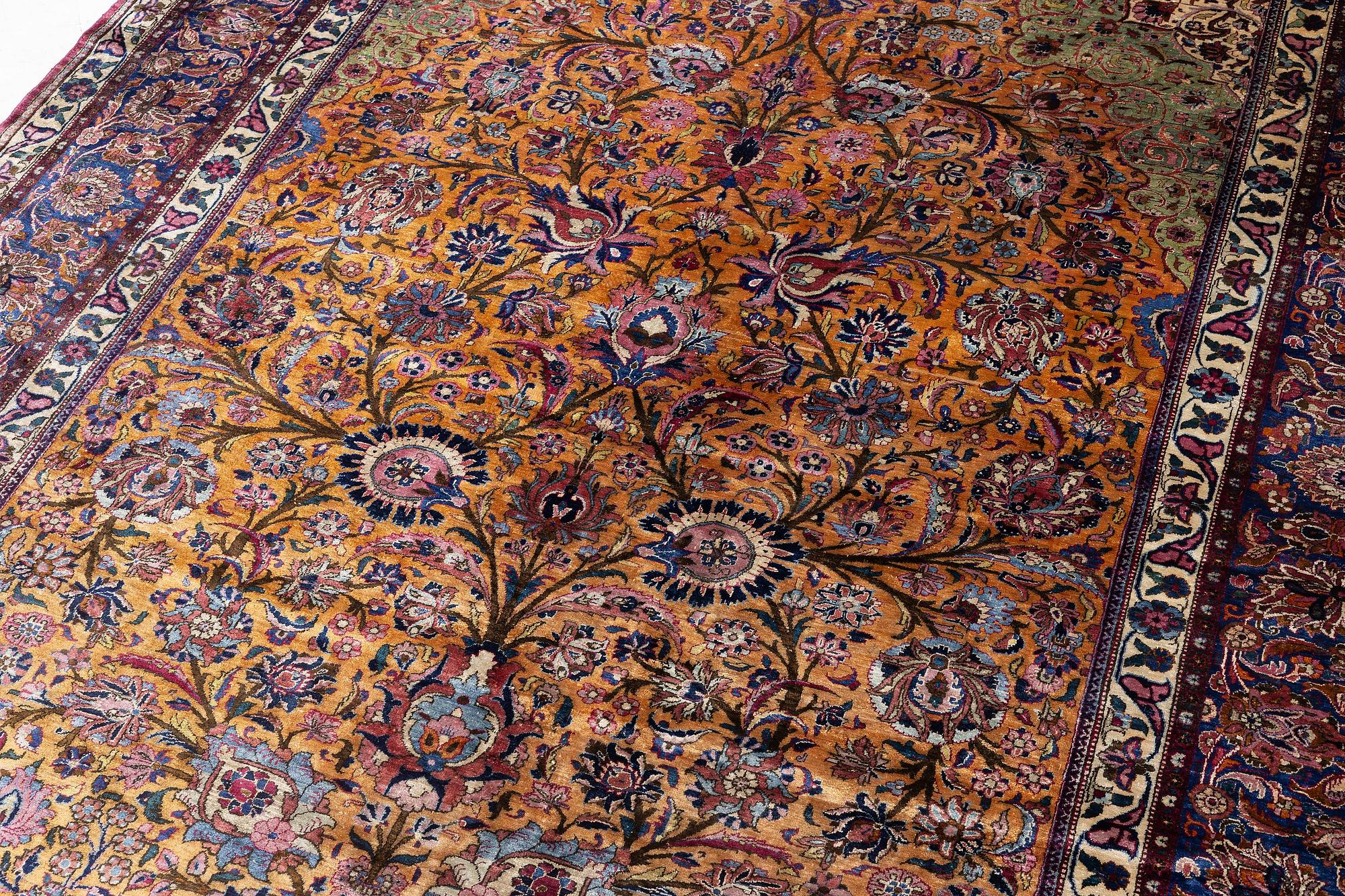 An antique silk Kashan carpet, central Persia (Iran), c. 314 x 210 cm.