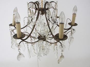 LJUSKRONA, rokokostil. H 80.
Proveniens: Git Gay.