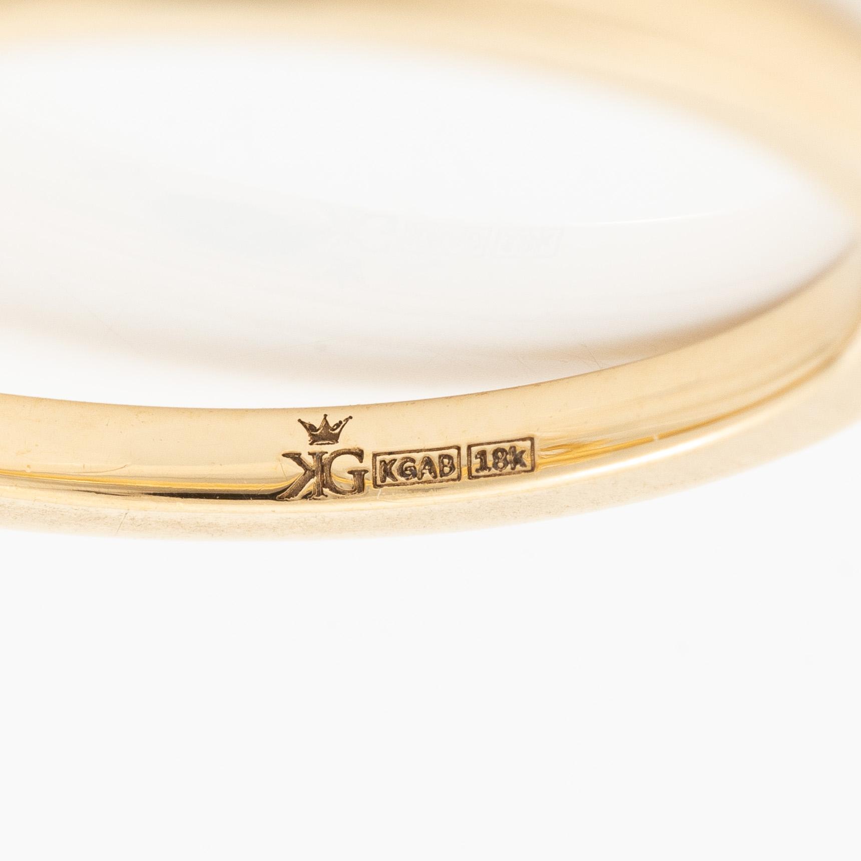Ring 18K guld med ovalslipad diamant 0.72 ct, medföljande GIA dossier.