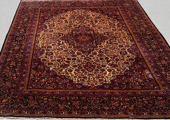 A carpet, semi-antique/old silk Kashan, ca 318,5 x 213,5 cm.