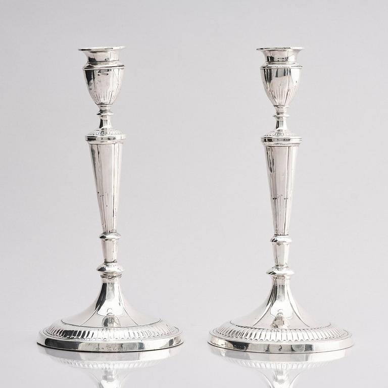 A pair of 18th century silver candlesticks, marks of John Parson & Co, Sheffield 1791.