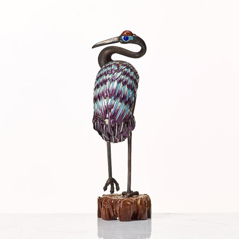 A silver and enamel figure of a crane, first half of 20th Century.