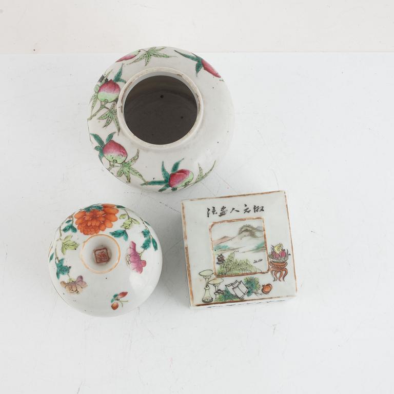 A Chinese famille rose peach vase, a jar and a box with covers, late Qing dynasty/20th century.