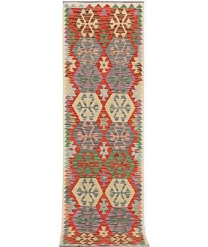 A runner carpet, Kilim, c. 289 x 78 cm.