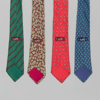 A set of four silk ties by Hermès.