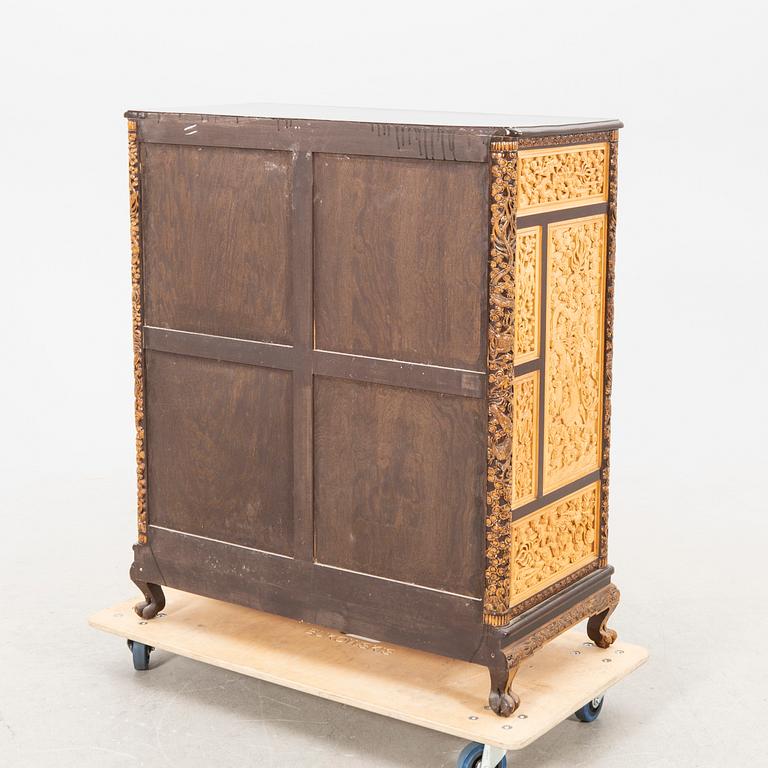 A Chinese wooden cabinet  mid 1900s.