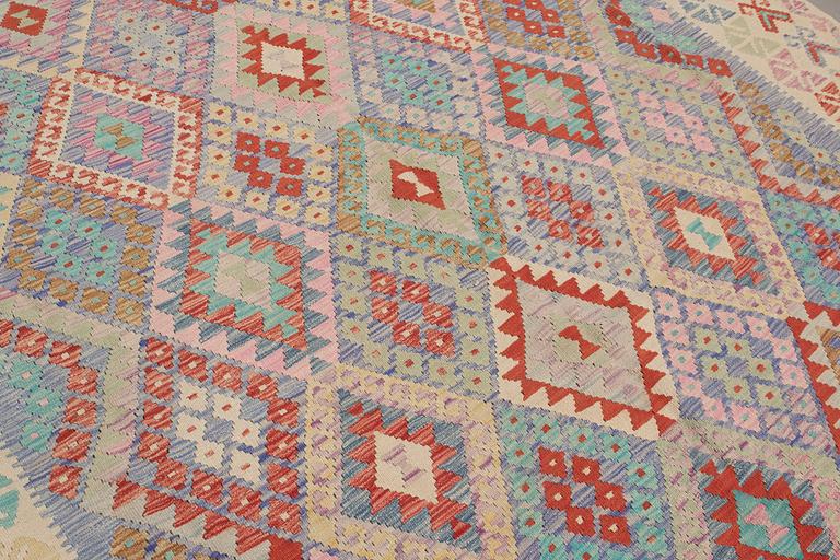 A carpet, kilim, ca 290 x 257 cm.