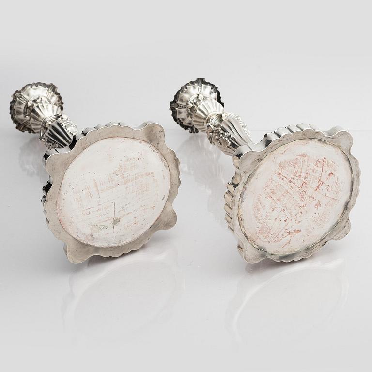 A pair of silver candlesticks, marks Gustaf Möllenborg, Stockholm 1845.