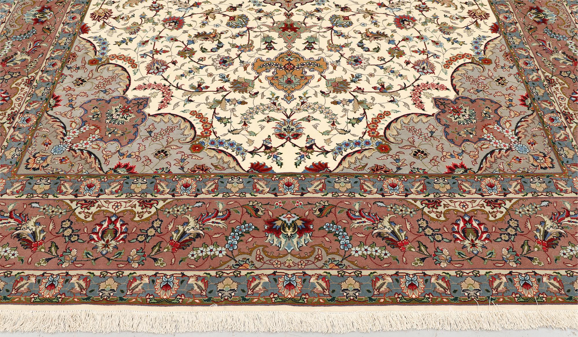 A part silk Tabriz carpet, so-called 50 Raj, approx. 356 x 250 cm.