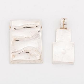 Rolf Karlsson two silver pendants.