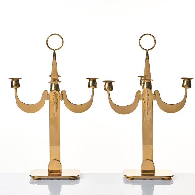Josef Frank, a pair of brass candelabra by Svenskt Tenn, Sweden 1950's, model nr 2663.