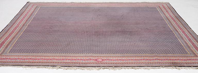 A oriental carpet, signed, c. 295 x 295 cm.