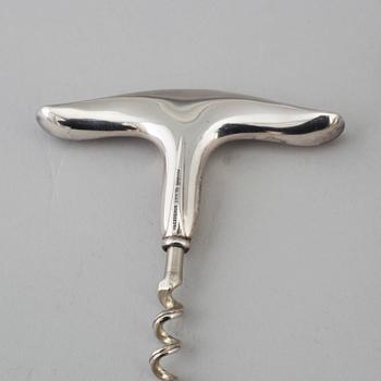 A Knud Möller sterling silver and steel bottle opener and wine opener, W&S Sörensen, Denmark, 20th century.