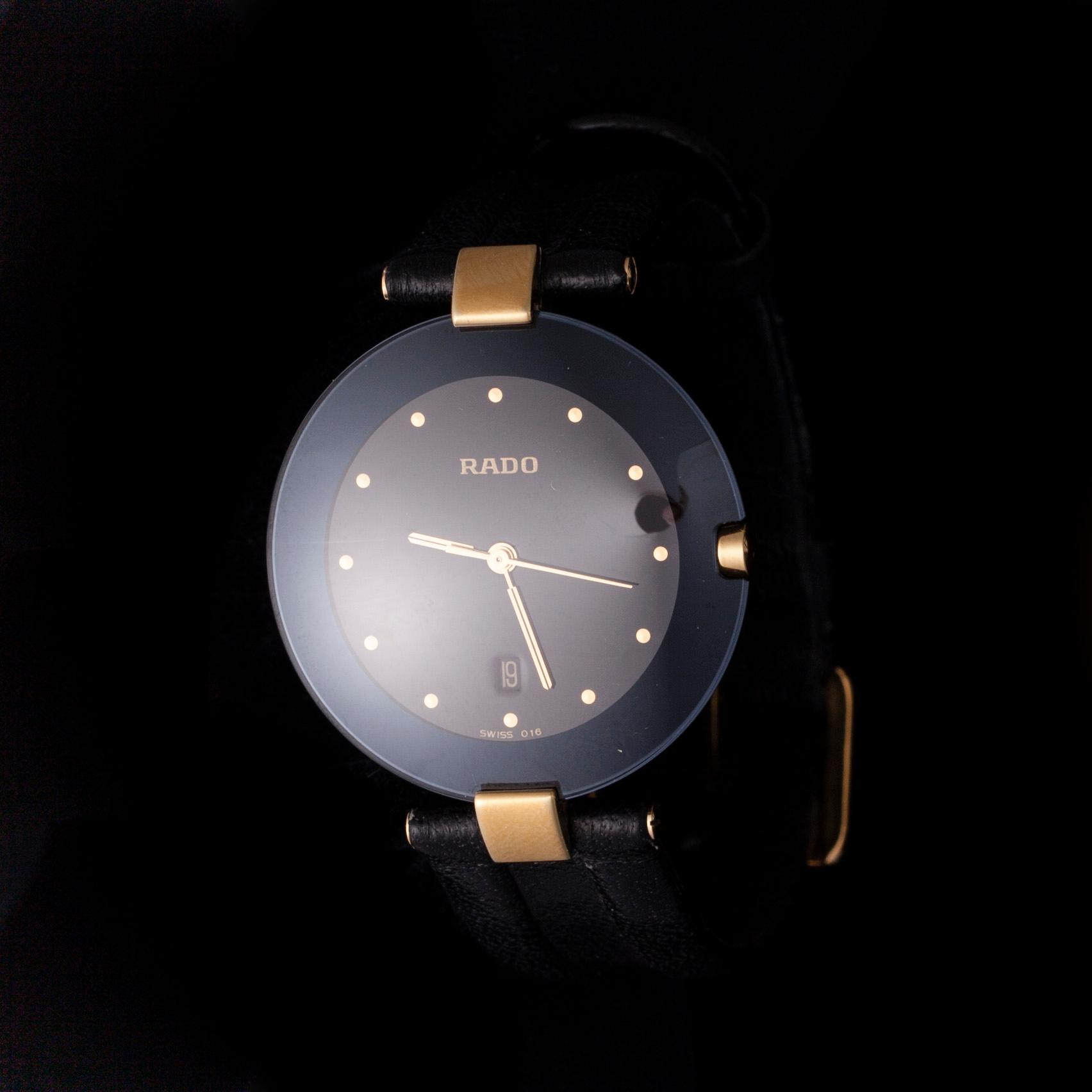 ARMBANDSUR, Rado, svart läderarmband, originaletui. Garantikort 1990.