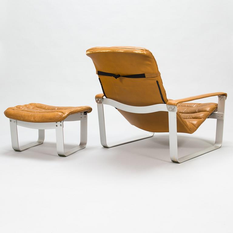 ILMARI LAPPALAINEN, a pair of 'Pulkka' lounge chairs with ottomans for , Asko, Finland.