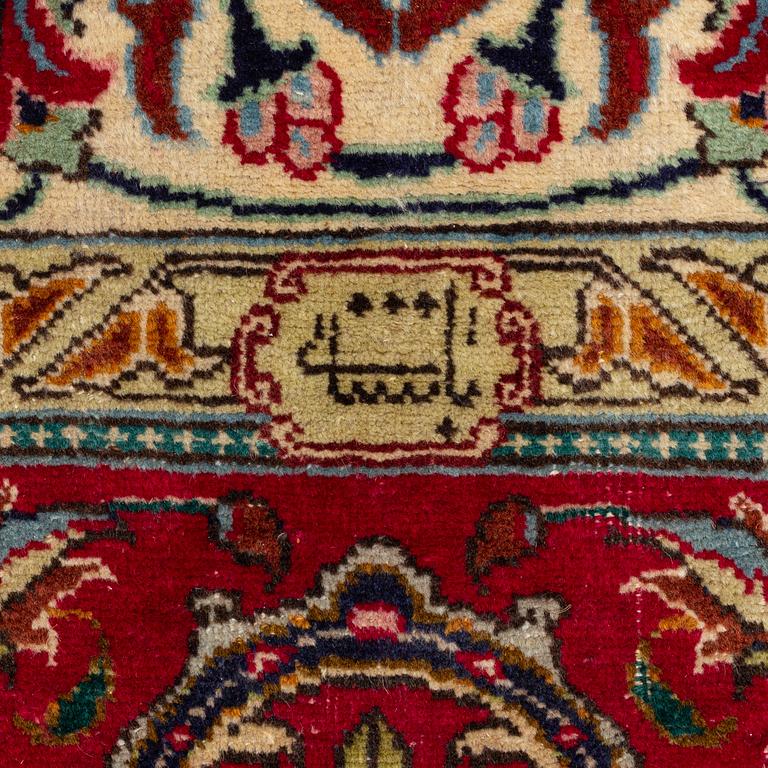 A Tabriz Carpet, circa 316 x 220 cm.