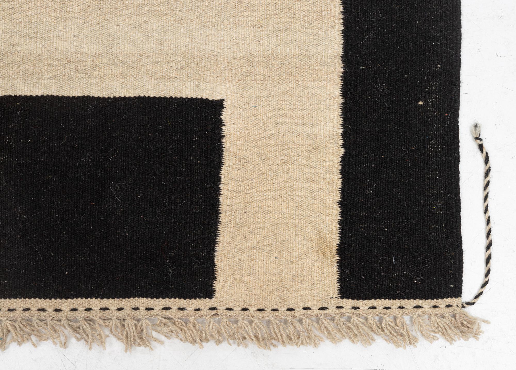A kilim runner, c. 393 x 93 cm.