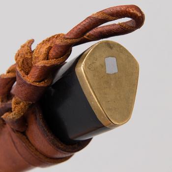 TAPIO WIRKKALA, PUUKKO-KNIV, rostfritt stål, nylon och mässing, Hackman Finland. Modellen formgiven 1961.