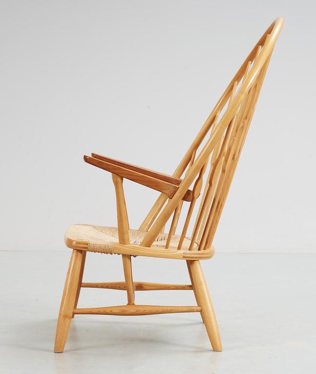 A Hans J Wegner ash and teak 'Peacock chair', Johannes Hansen, Denmark.