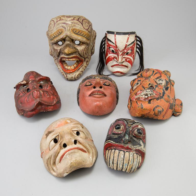 A group of dancing maskes, mostly Japanese Bugagku masks, Meiji period (1868-1912).