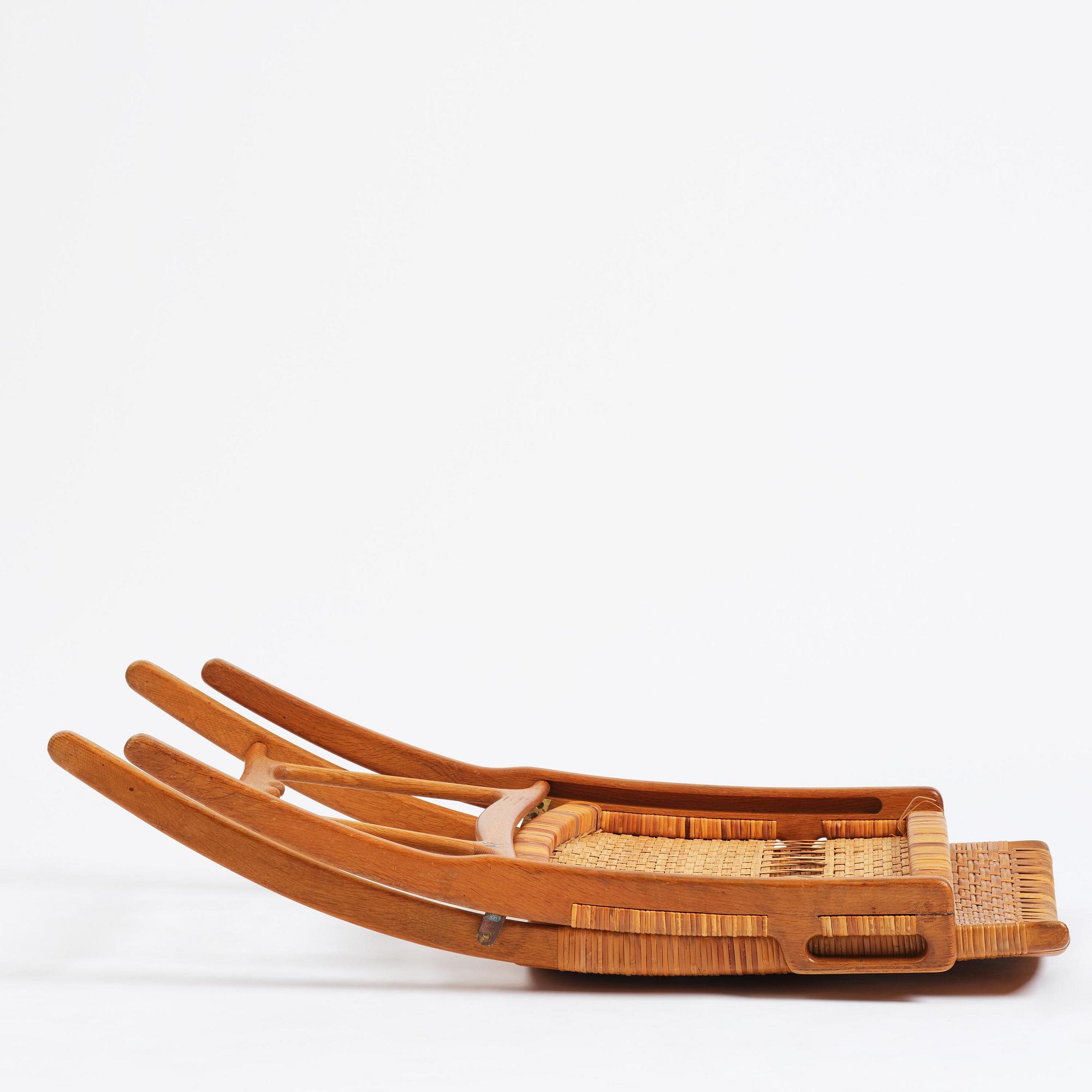 Hans J. Wegner, a foldable easy chair model 512, Johannes Hansen, Copenhagen, 1950s-60s.