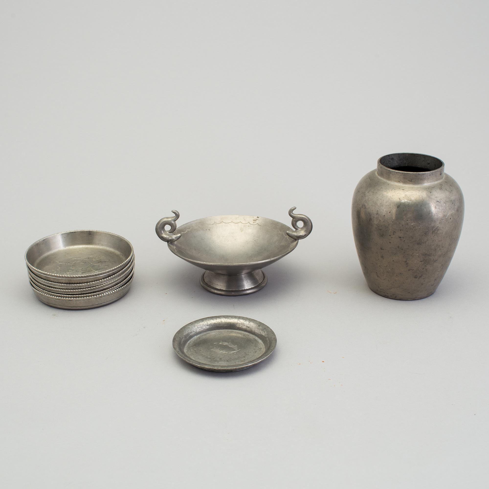 Five coasters, a vase, a bowl,  and an ashtray by Firma Svenskt Tenn first half of 20th centuty.
