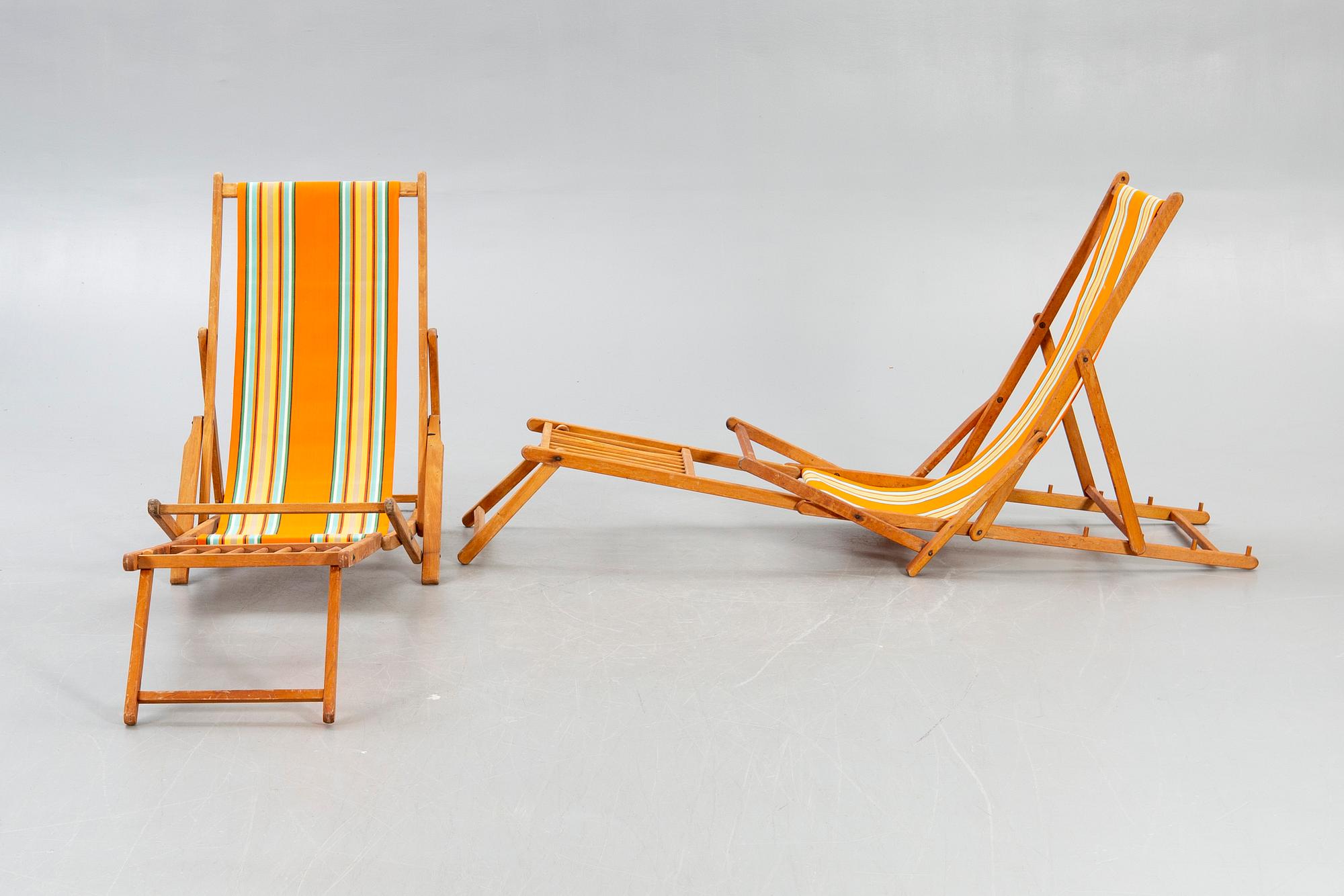 Sun loungers, a pair of footstools, 1950s.