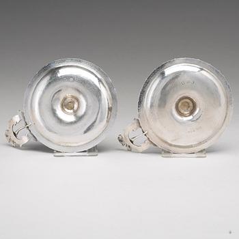 A pair of Swedish 18th century silver chamber-candlesticks, mark of Isak Sauter, Stockholm 1772.