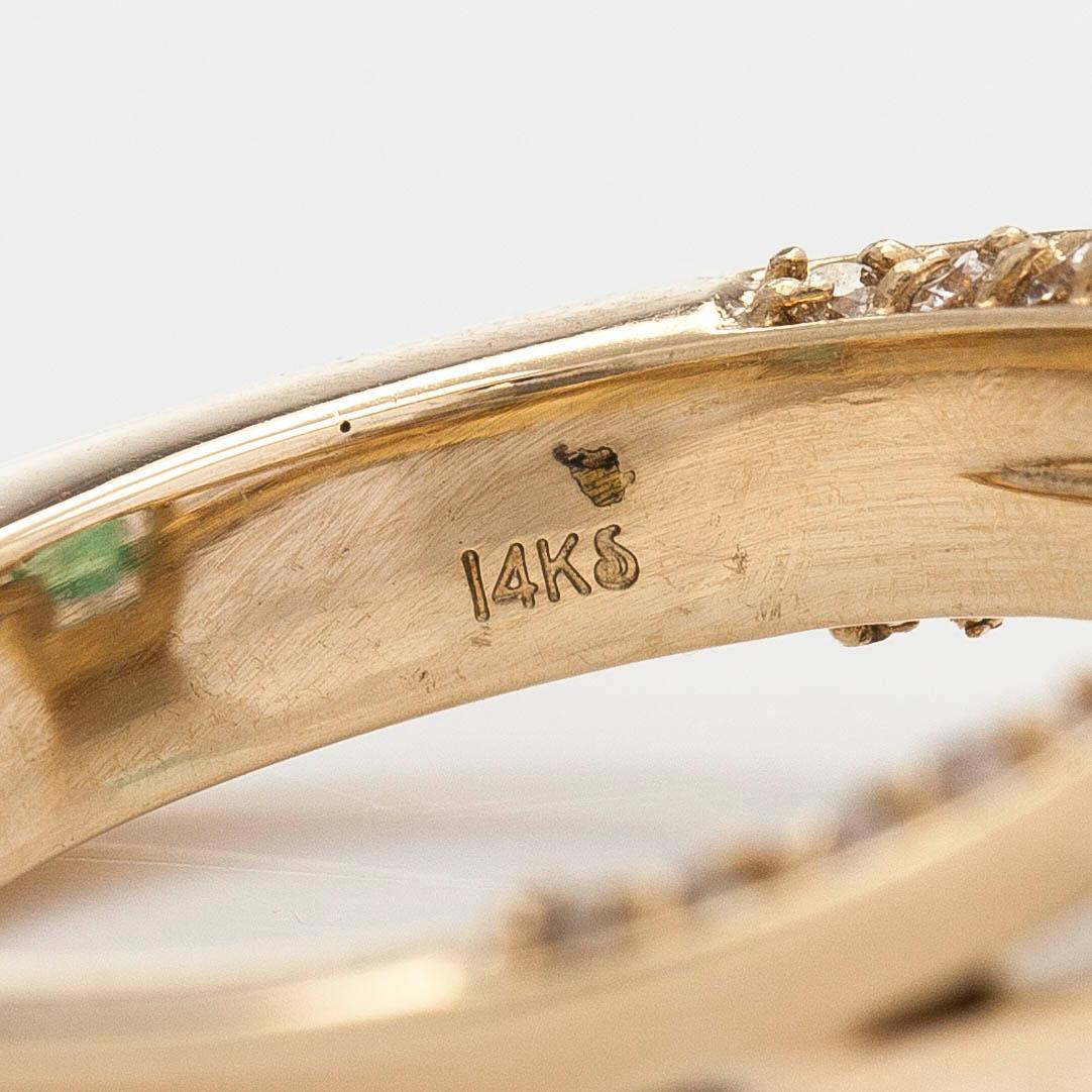 Ring, with an octagonal step-cut emerald and diamonds. Accompanied by GIA certificate.